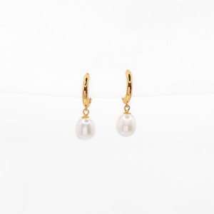 Earrings: Pearl huggies