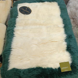 Products: Green Bordered Ivory Rug - Bowron Sheepskin Tannery & Factory