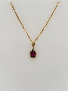 Products: Oval Rhodolite & Diamond Pendant - Global Diamonds