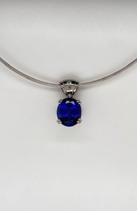 White Gold & Tanzanite Pendant - Global Diamonds