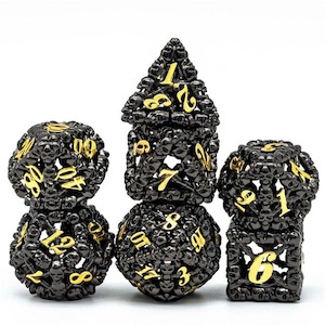 Latest Arrivals: Metal Dice | Hollow "Skull" Black & Gold | Set of 7