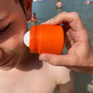 Sun Tan: Solmates Refillable Sunscreen Applicator - Orange