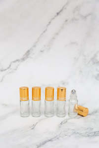 Glass Bottles: 5ml Clear Glass Rollerball Bottles with Gold Lids
