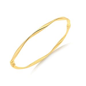 Yellow gold ribon twist bangle