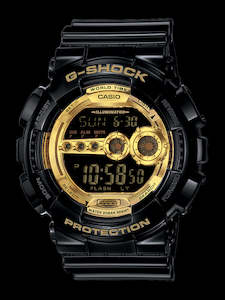 Watches And Body Jewellery: G-Shock GD100GB The basic black motif is accented by gold gears and dials that give these watches a mechanical look.