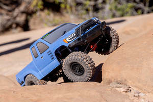 Trucks Cars: Axial 1/10 SCX10 III Base Camp 4WD Rock Crawler Brushed RTR