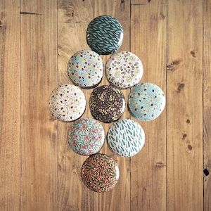 Tins of Stitch Markers