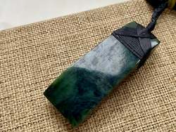 Frontpage: NZ Pounamu Curved Toki pendant