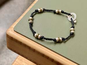 Earrings: Braided Pirepire Bracelet