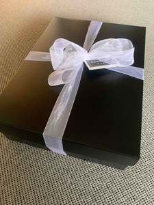 Products: Premium Glossy Black Box, Woodwool Packaging, Card, Tissue Paper Seal, Ribbon
