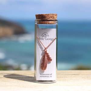 Earrings: Rua Huia Feather Necklace