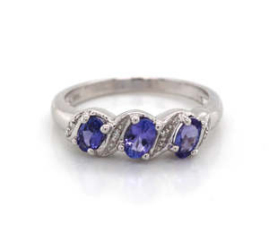 9ct White Gold Tanzanite Three Stone Ring with Diamonds