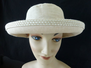 Products: S703 summer seagrass linen hat with interesting contrast trim around the brim Hokianga Hats