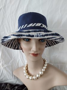 Products: R264: Navy linen/cotton hat with striking navy and white stripe reverse and trim Hokianga Hats