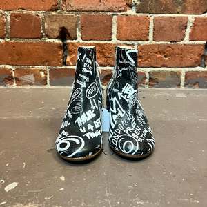 Products: MARTIN MARGIELA graffiti boots 38