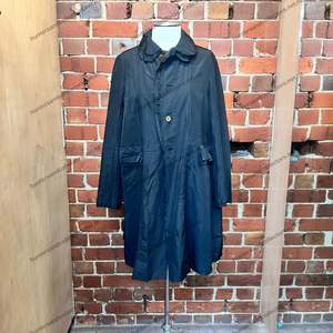 Womenswear: COMME DES GARCONS 2015 6 layer coat