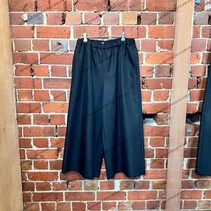 Womenswear: COMME DES GARCONS 2024 wide leg pants