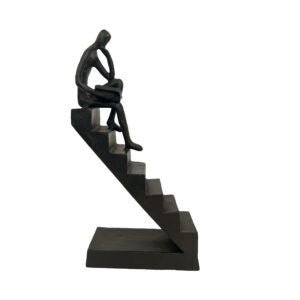 Homewares: Girl Reading On Stairs Bookends