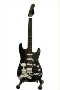 Minature Guitar on Stand Ozzie Osbourne