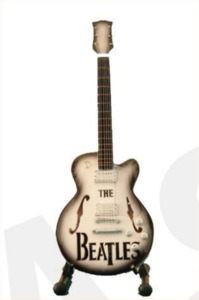 Minature Guitar on Stand The Beatles