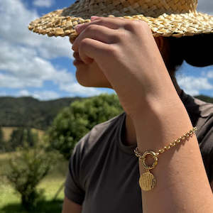 Taonga Jewelry: Rangimarie Charm Bracelet - Silver