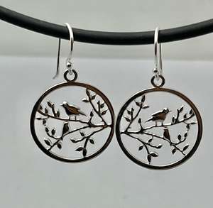 Quirky Collectibles: Sterling silver bird in tree drop earrings