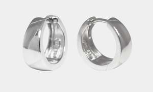 Quirky Collectibles: Tapered highly polished semi oval shaped huggies earrings