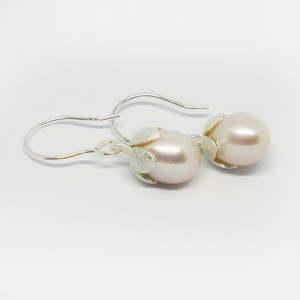 Quirky Collectibles: Sterling silver textured petal cap cultured pearl drop earring