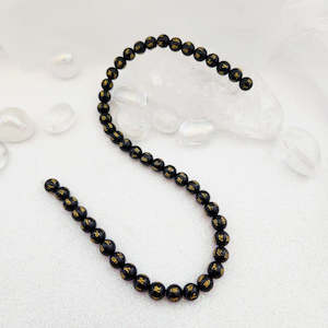 Black Obsidian Om Mane Padme Hum Bead Strand (approx. 46-48x8mm beads)