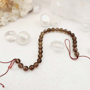 Beads Other Crafts: Smoky Quartz Bead Strand (approx. 21-23 x 8mm round beads)