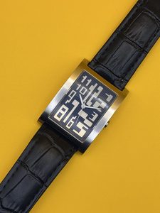 Products: Jean Paul Gaultier Men’s Tank Wristwatch