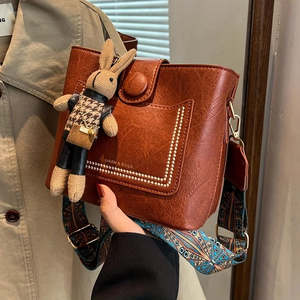 Gifts Novelties: Vintage Faux Leather Crossbody Bag with Wide Strap & Bunny Charm