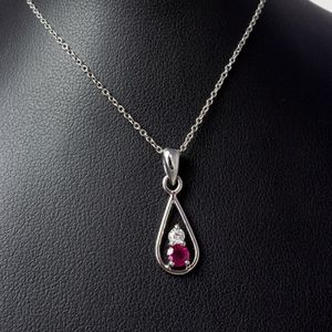 Fine Jewellery Jewellers Bench: Handmade Minimalist Ruby and Diamond Pendant