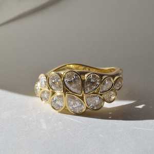 Bespoke: Graduating pear diamonds in 18ct gold