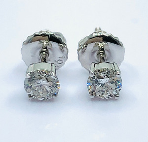 Products: Round Solitaire 0.40 Carat TW of I1 Diamond Stud Earrings J Ferns Jewellery