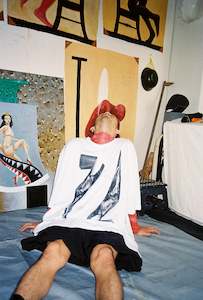 031a Mudd Club Chapters 1 2: Kaboom Tee, White - Candle Shoe Print