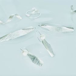 Earrings: Soaring wing pearl earrings