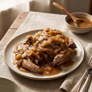 SHARE Slow-Roasted Pork with Apple Cider Gravy
