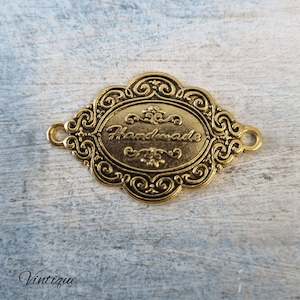 Antique "handmade"tag Gold 42mm x 26mm