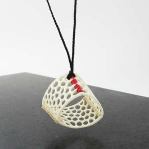 Red and Cream Holey Pendant