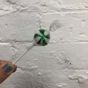 Green Sprinkles: Green and white round ball swirly lollipop