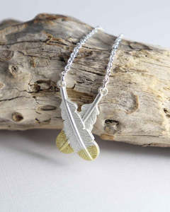 Necklaces: Crossed Huia Feather Necklace - Silver
