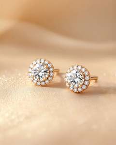 Diamond Studs with Centre stone and small stone round cut style