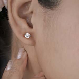 Frontpage: 1.20 Carat TW Round Lab-Grown Diamond Solitaire Stud Earrings in Yellow Gold