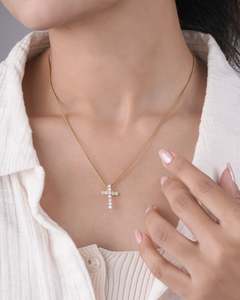 Frontpage: 0.79ct Diamond Cross Pendant in 9kt Yellow Gold