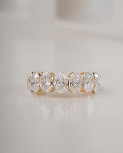 Frontpage: 4ct Seven Stone Oval Lab Grown Diamond Eternity Ring in Yellow Gold