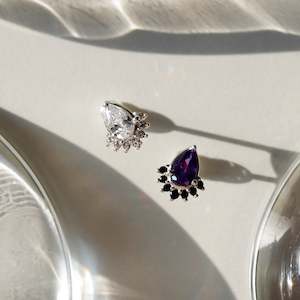 Dreamscape teardrop piercing