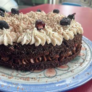 Bakery: Chocolate and Raspberry Cake with Whipped Cream