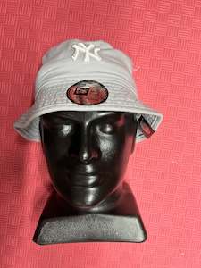 Bucket Hats: NEW ERA BUCKETS NY 12891391
