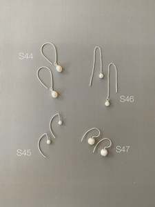 Nami Skyla: Whispering Threads with Pearls